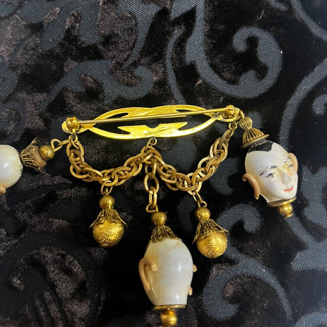 ヴィンテージ人形顔ブローチ