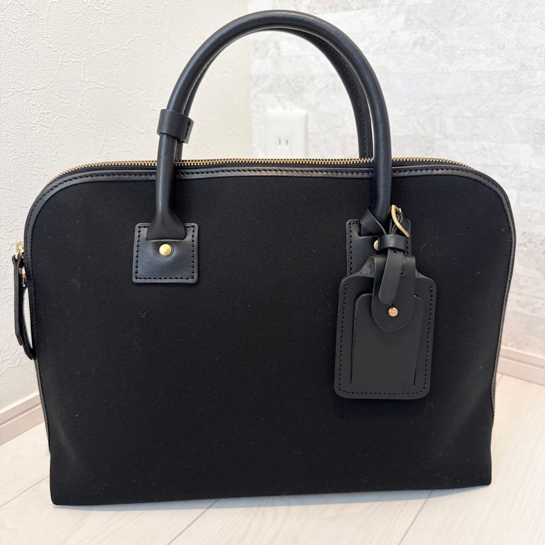 SLOW　TRADITIONAL コットンサージ/ラウンドブリーフケース