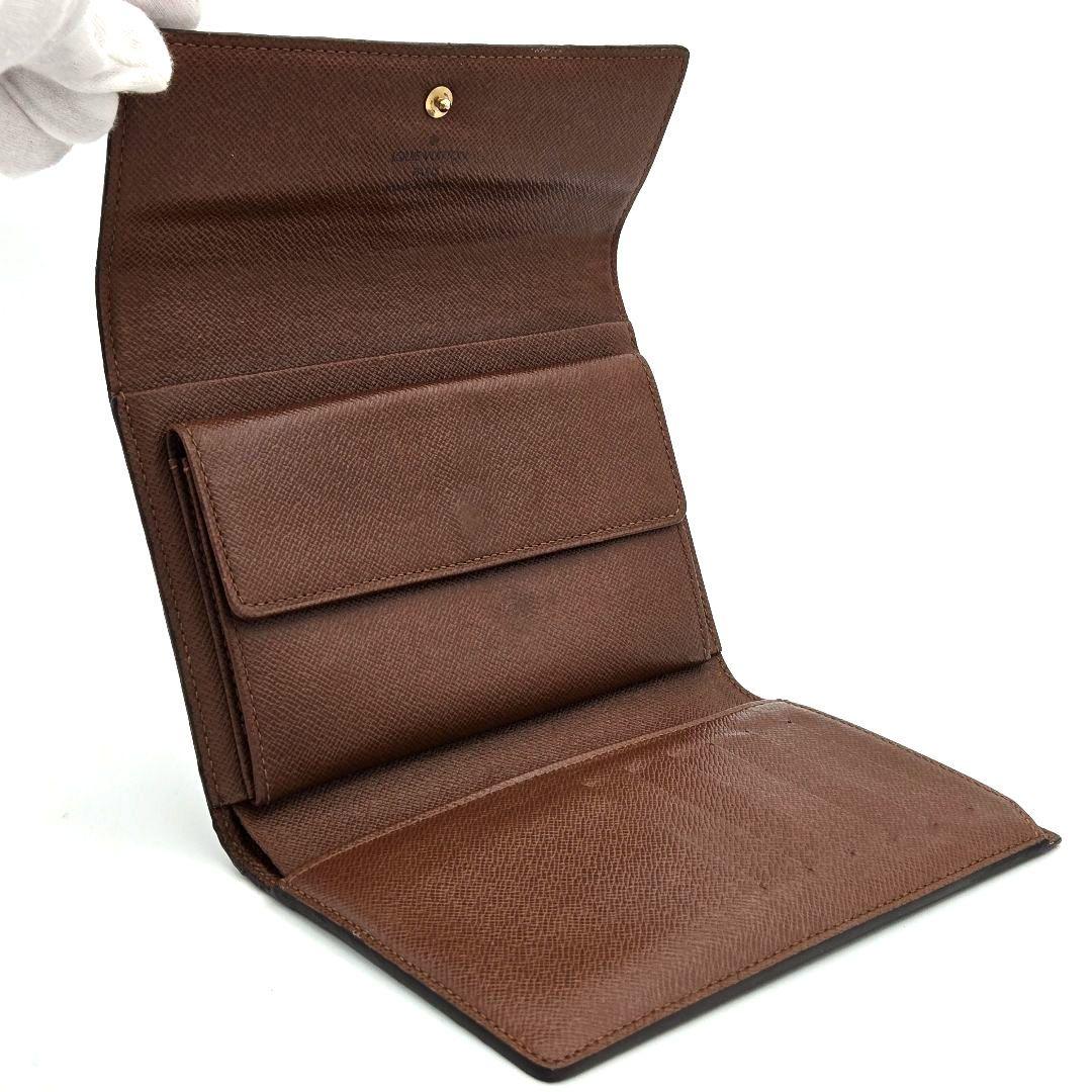 ルイヴィトン ポルトトレゾール エテュイパピエ モノグラム 折り財布 パスポート