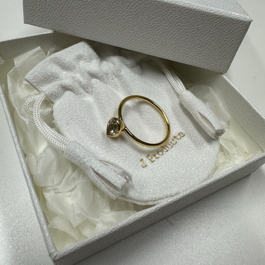 【セール】JProducts 18k teardropringSホワイトトパーズ