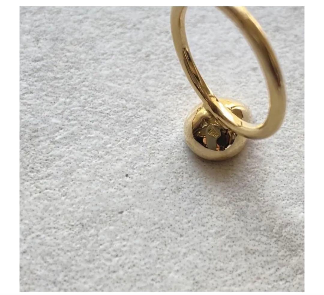 【セール】JProducts 18k teardropringSホワイトトパーズ