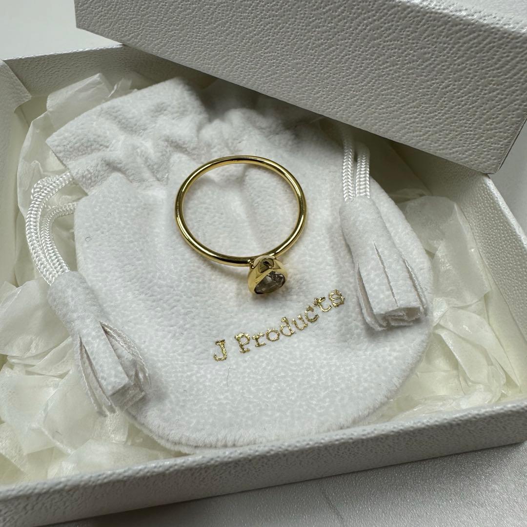 【セール】JProducts 18k teardropringSホワイトトパーズ