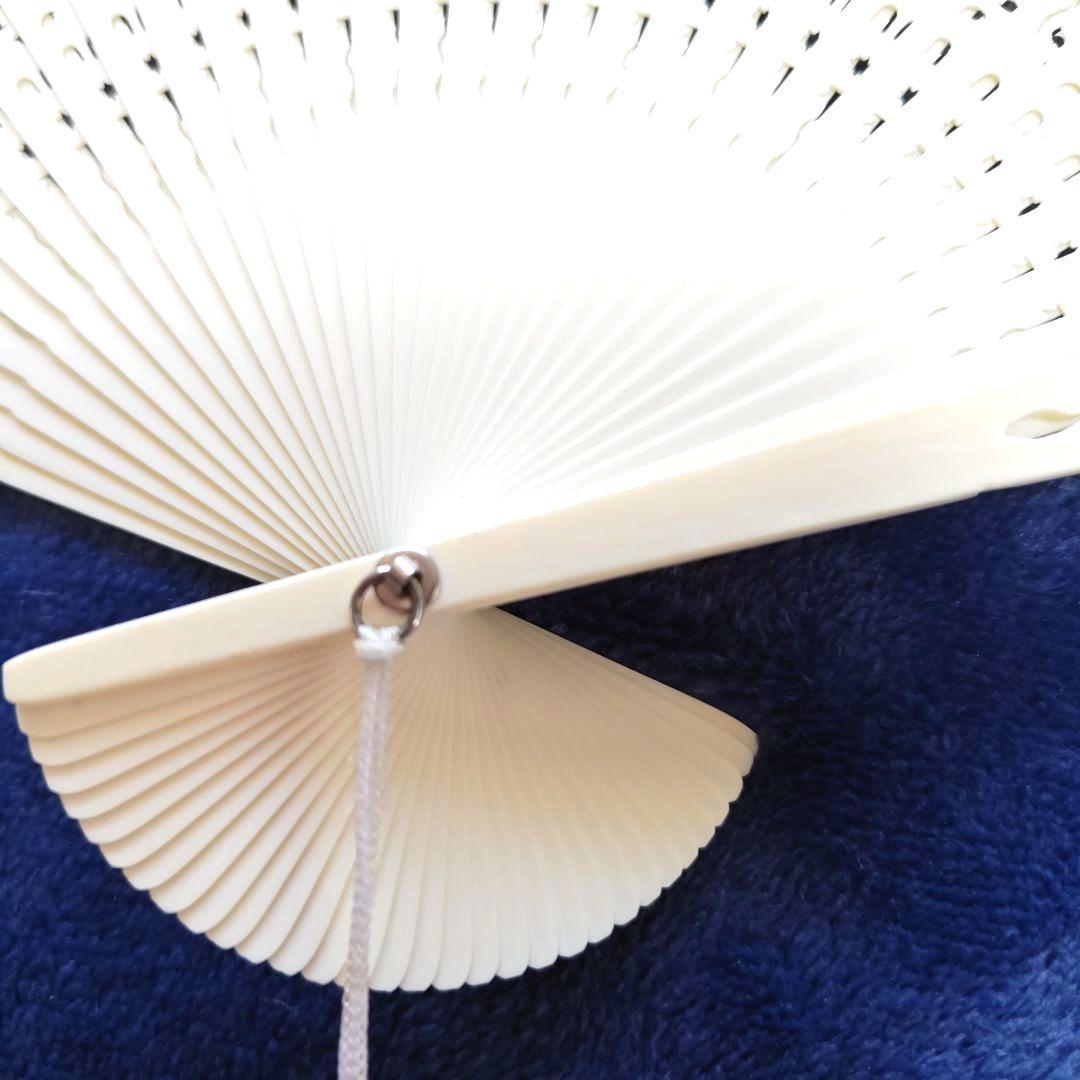 透かし彫り扇子