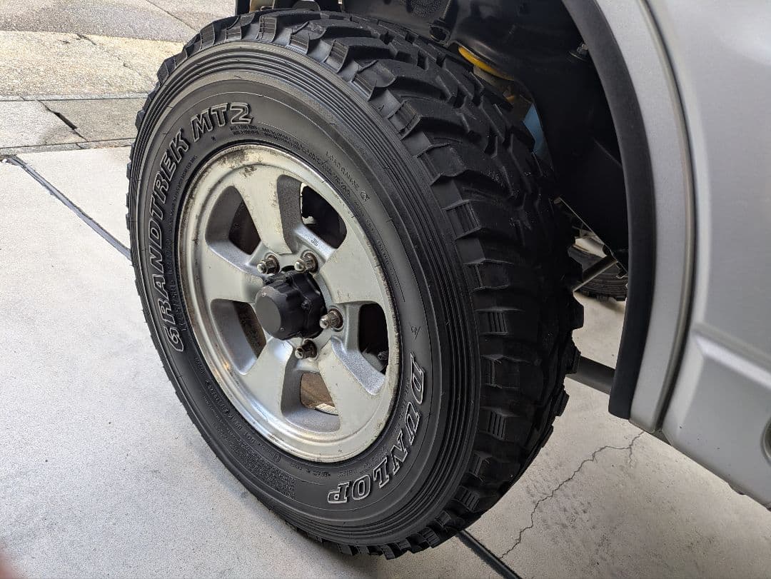 ジムニーJA22純正ホイール・ダンロップ　グラントレックMT2です。