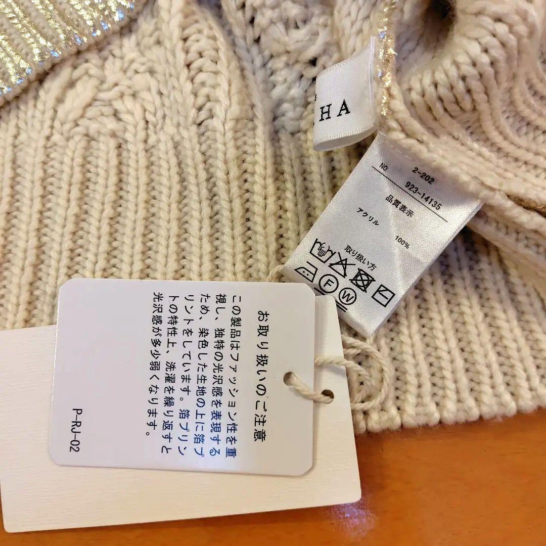 プラスオトハ 箔デザイン ケーブルニットプルオーバートップス