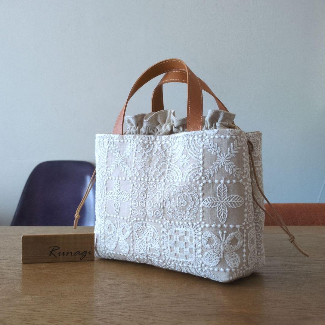 あおりポケットの巾着バッグ＊ミナペルホネン foresttile