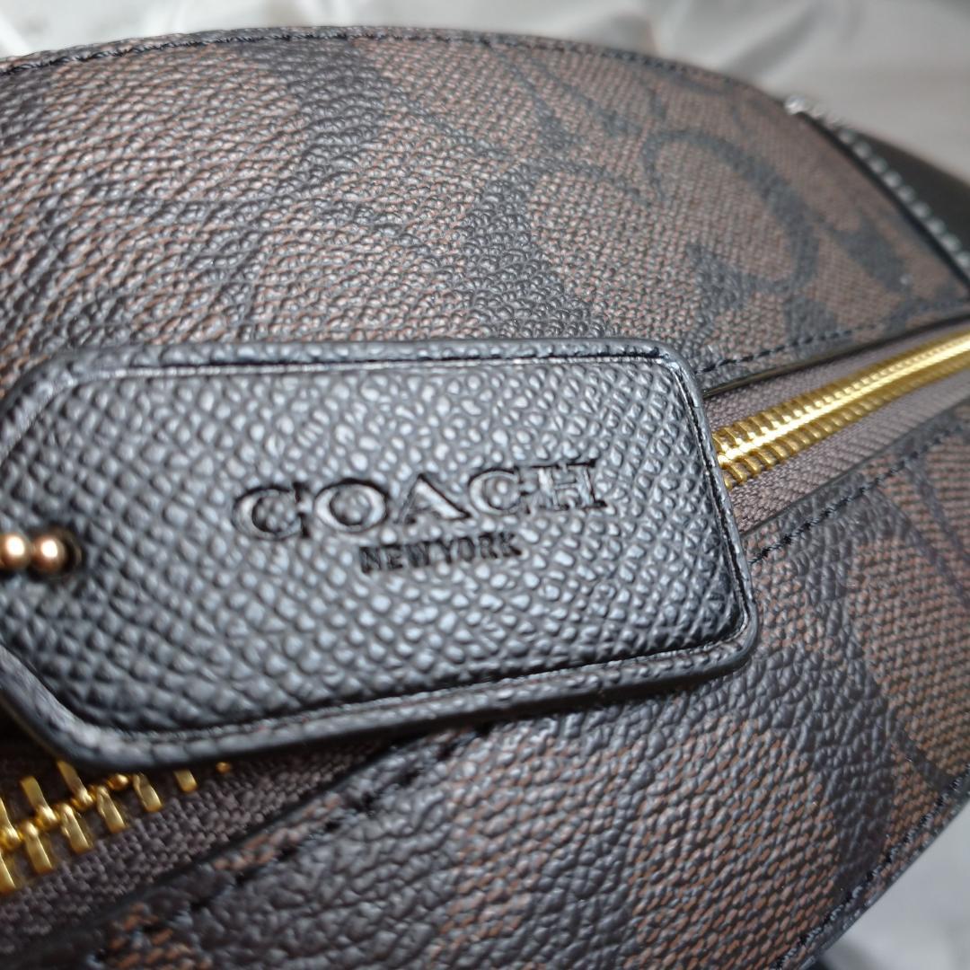 【新品未使用】コーチ リュック シグネチャー C2002 ベージュ