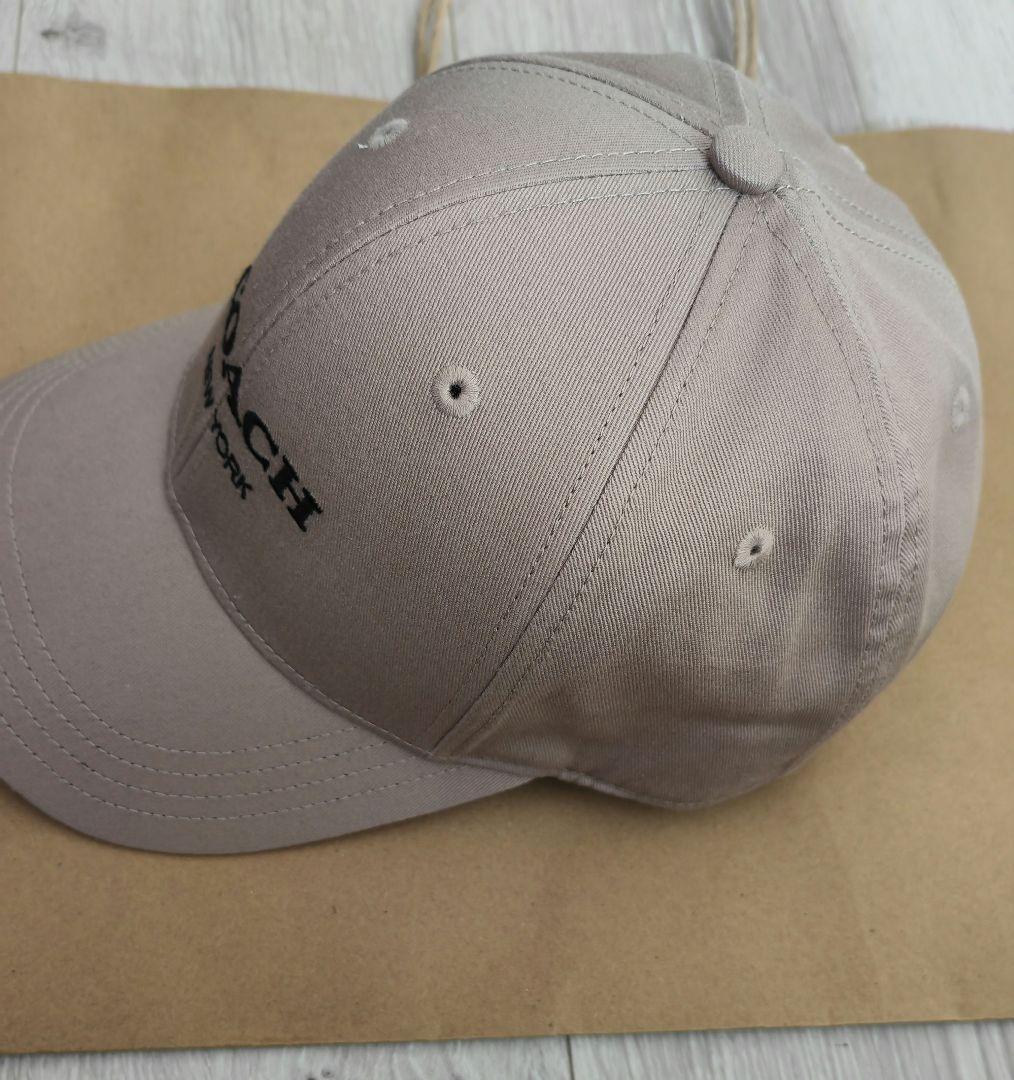 COACH ベージュ キャップ ロゴ入り