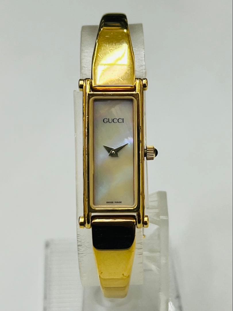 【電池交換済】グッチ レディース 腕時計 1500 白文字盤 シェル ゴールド