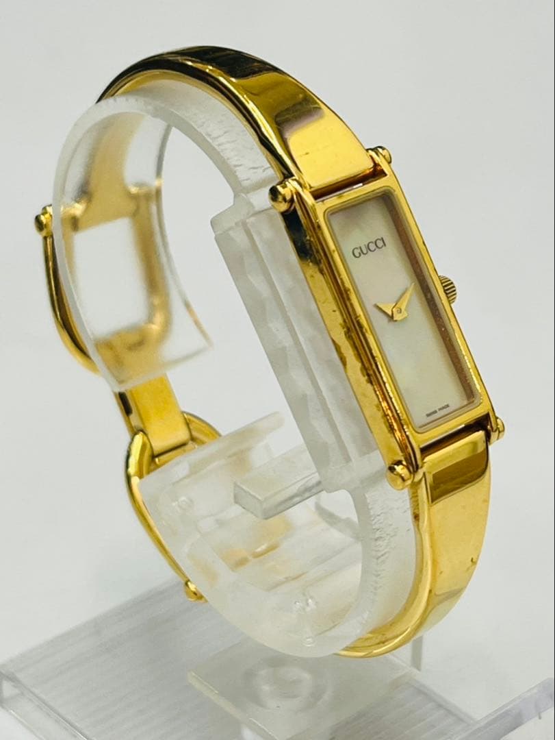 【電池交換済】グッチ レディース 腕時計 1500 白文字盤 シェル ゴールド