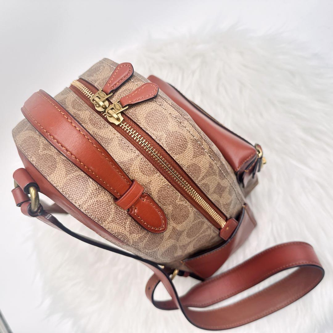 美品✨ COACH PVC レザー ターンロック シグネチャーミニリュック