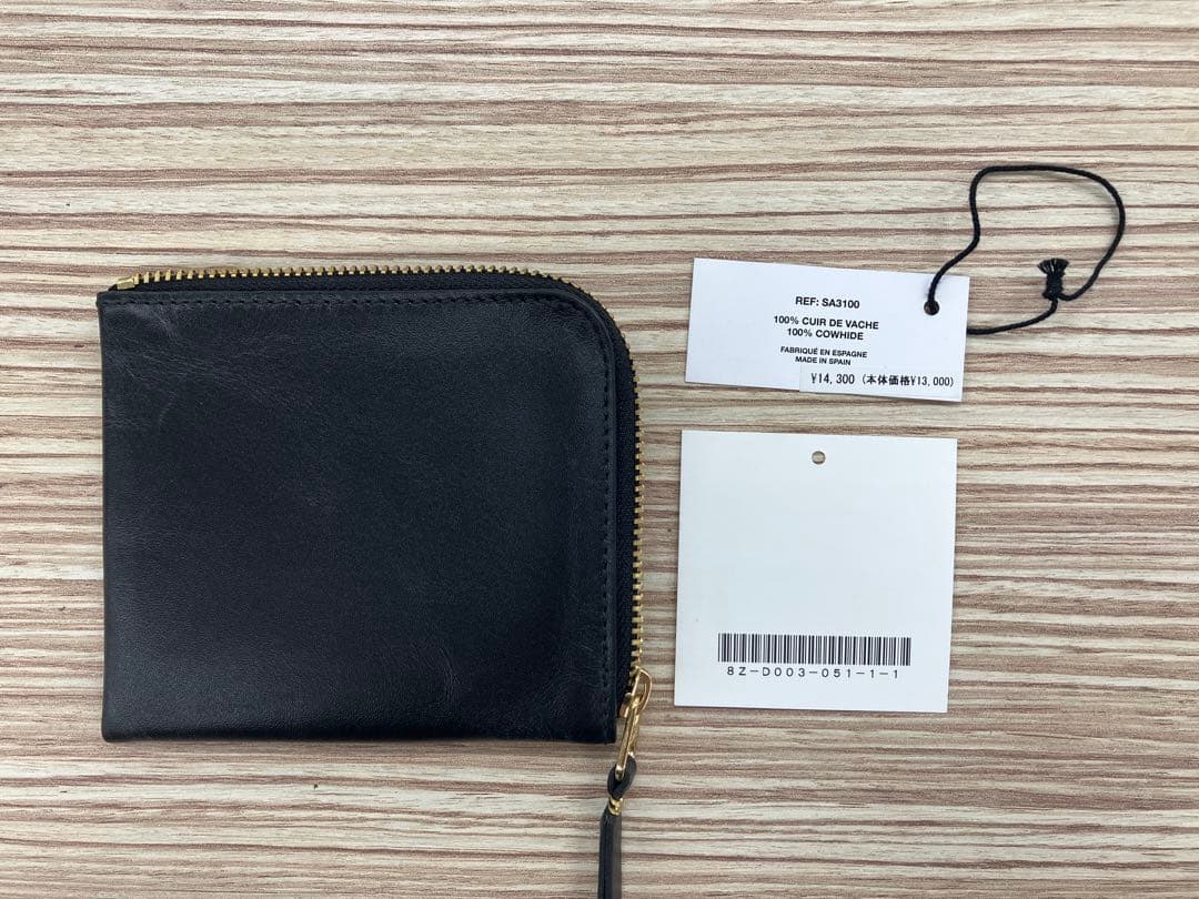 COMME des GARCONS ブラックレザー ケース