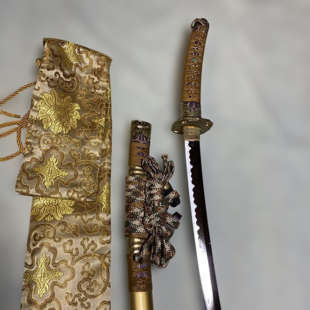 豪華版模造刀(刀袋付) 太刀造り 金茶柄 太刀型金鍔 金呂鞘