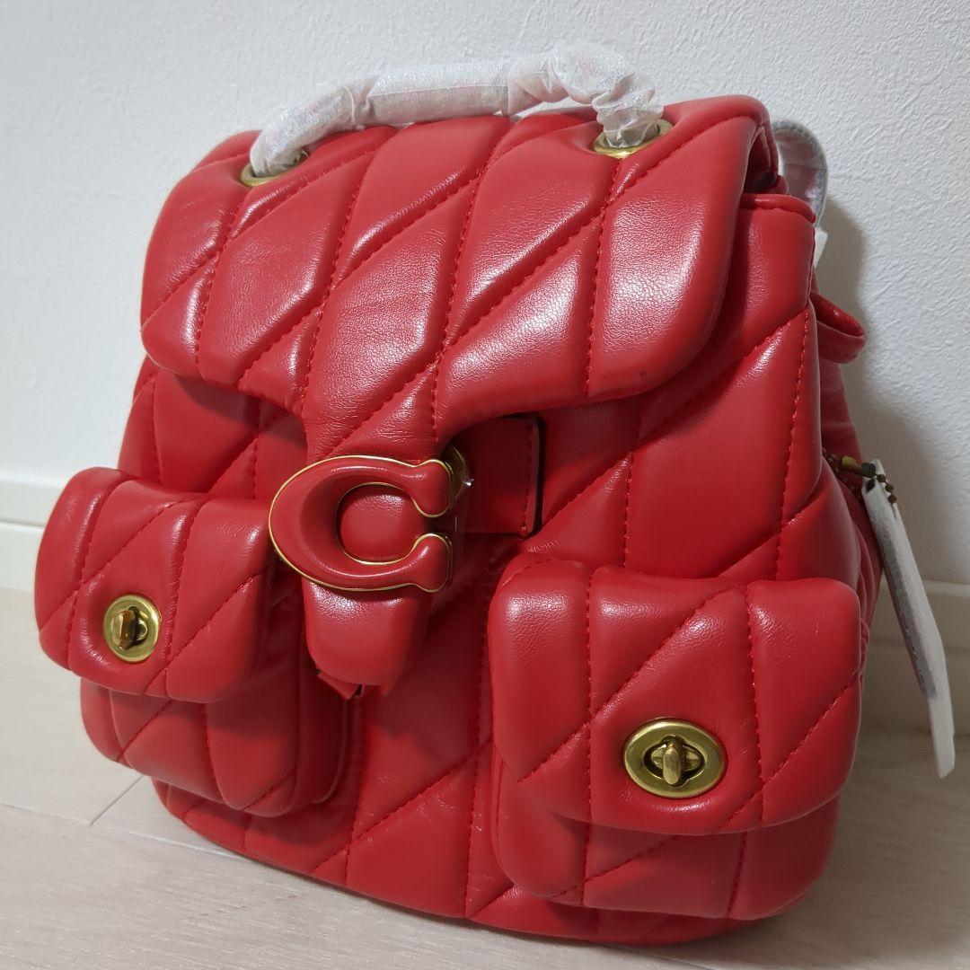 【新品】COACH　タビー バックパック・キルティング　レッド系　CU077