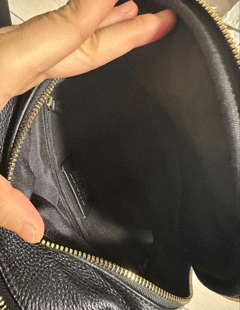 バッグ COACH PEBBLED LEATHER COURT BACKPACK