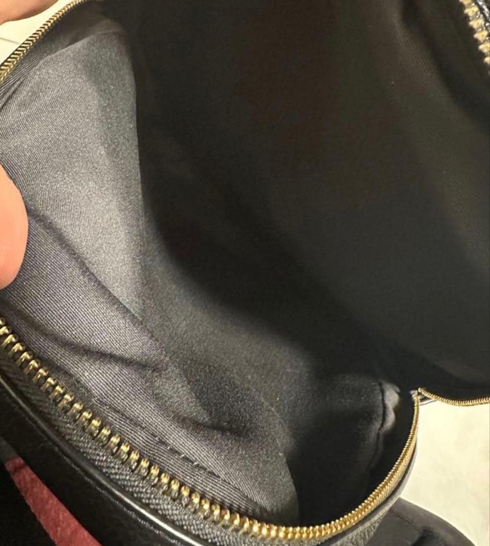 バッグ COACH PEBBLED LEATHER COURT BACKPACK