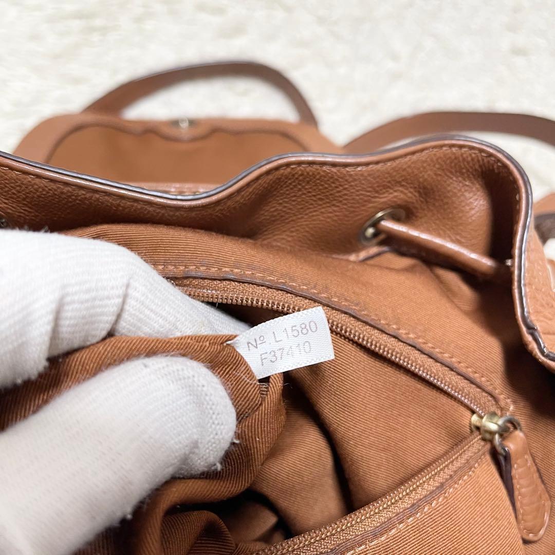 【美品/A4可】COACH 巾着　リュック　レザー　ターンロック　ゴールド金具