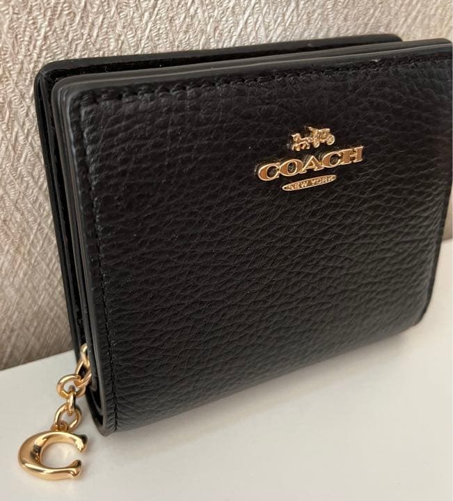 コーチ二つ折り財布