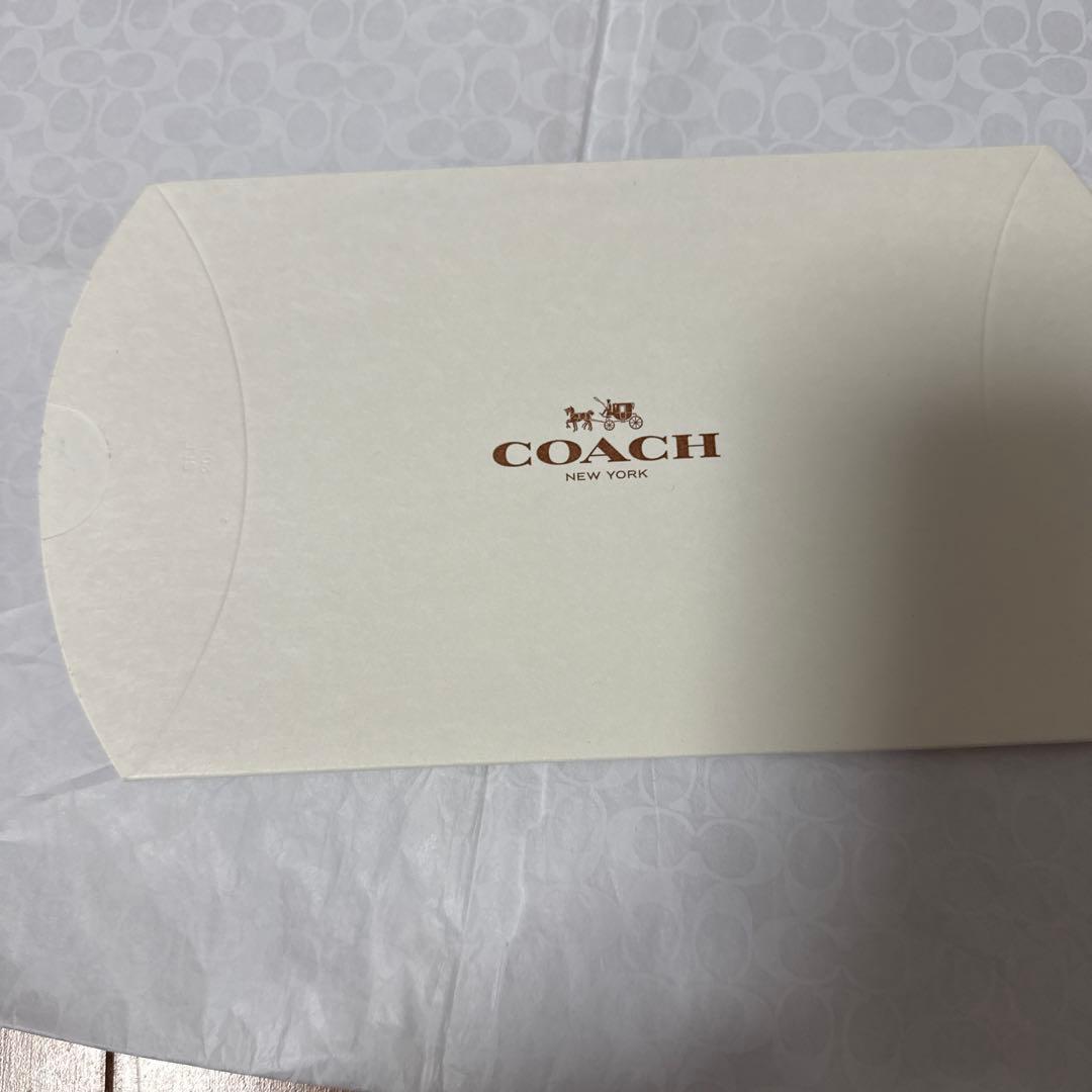 コーチ二つ折り財布