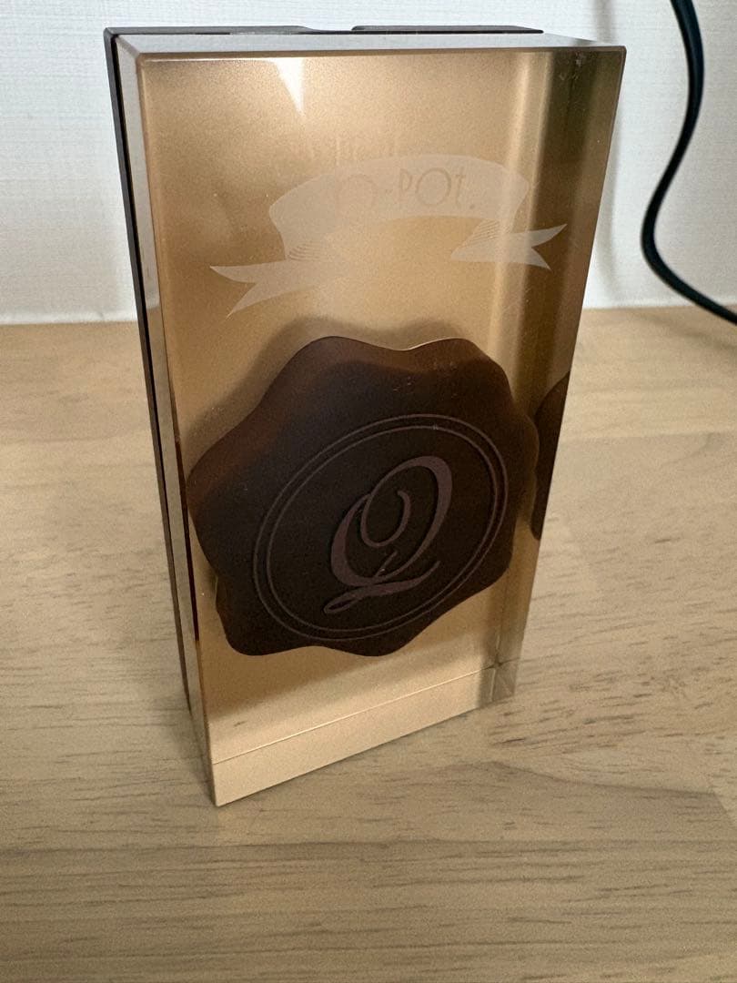 Q-pot.スマートフォン　チョコレート　ジャンク品