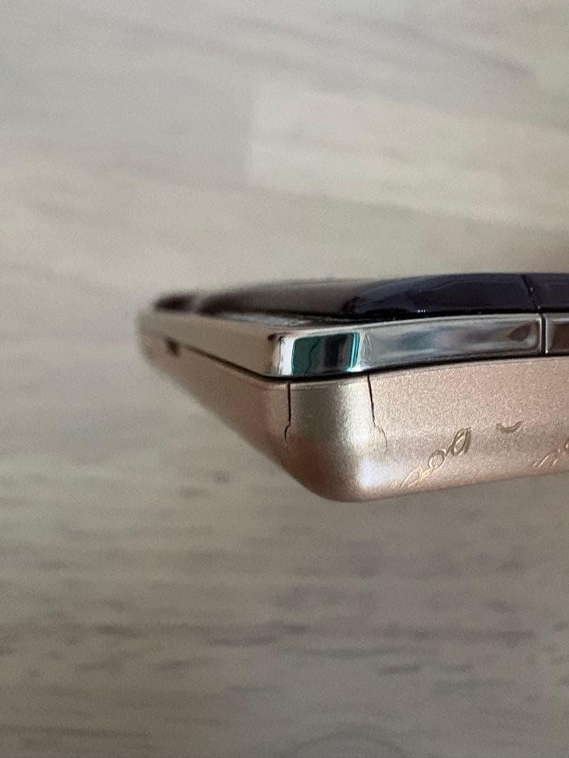 Q-pot.スマートフォン　チョコレート　ジャンク品