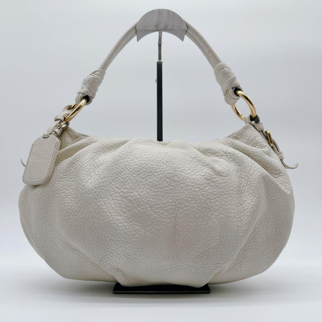 PRADA ワンハンドバッグ レザー ホワイト メタルロゴ ハーフムーン