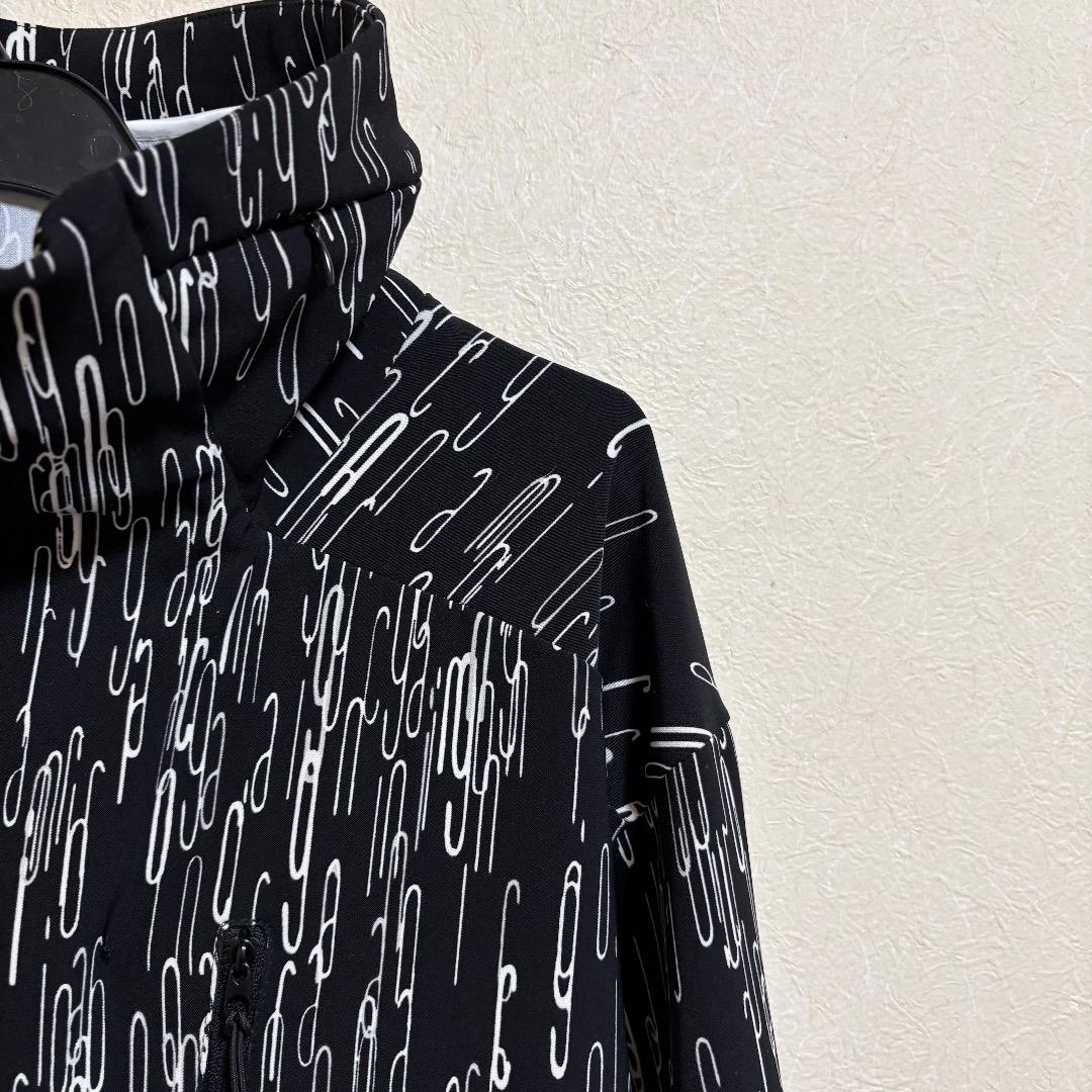 ウノピゥウノウグァーレトレ 4WAY総柄グラフィックスタンドネックジャケット