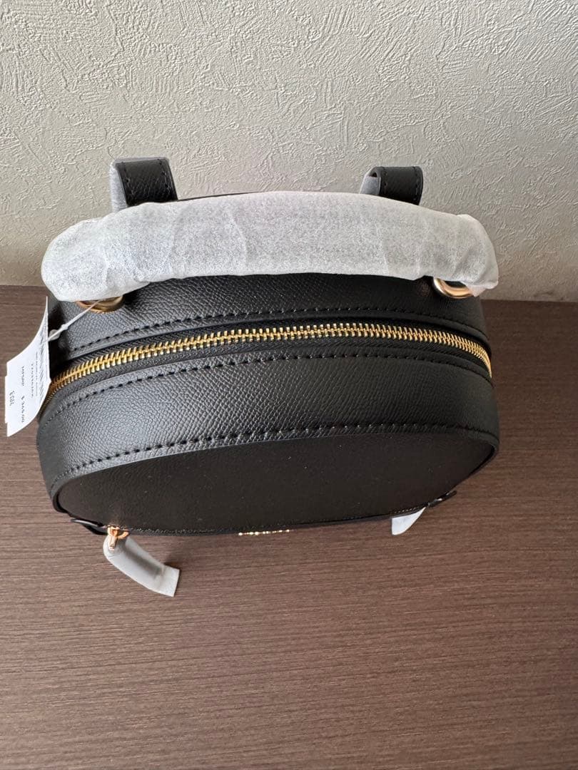 R*様 COACH ブラック バックパック