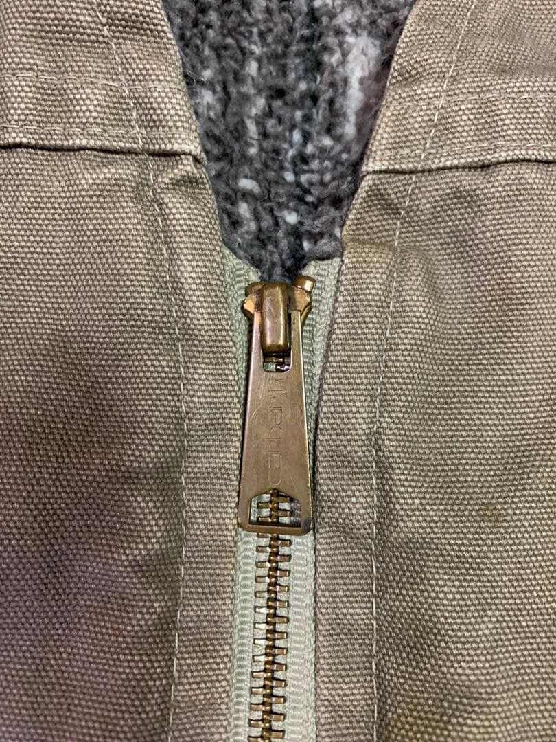 USA Carharttダック地ベスト 裏地ネイティブ柄 ボア ライナーXL