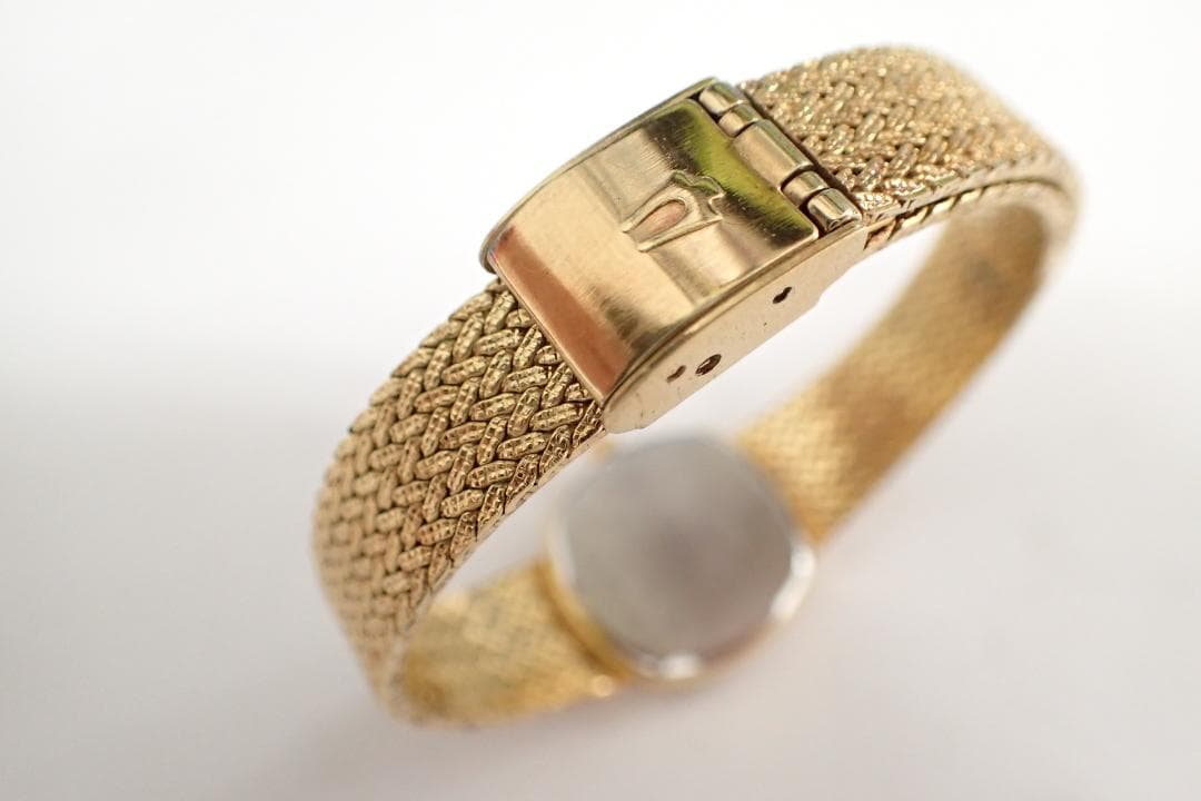 BULOVA ブローバ ゴールドカラー クオーツ 腕時計