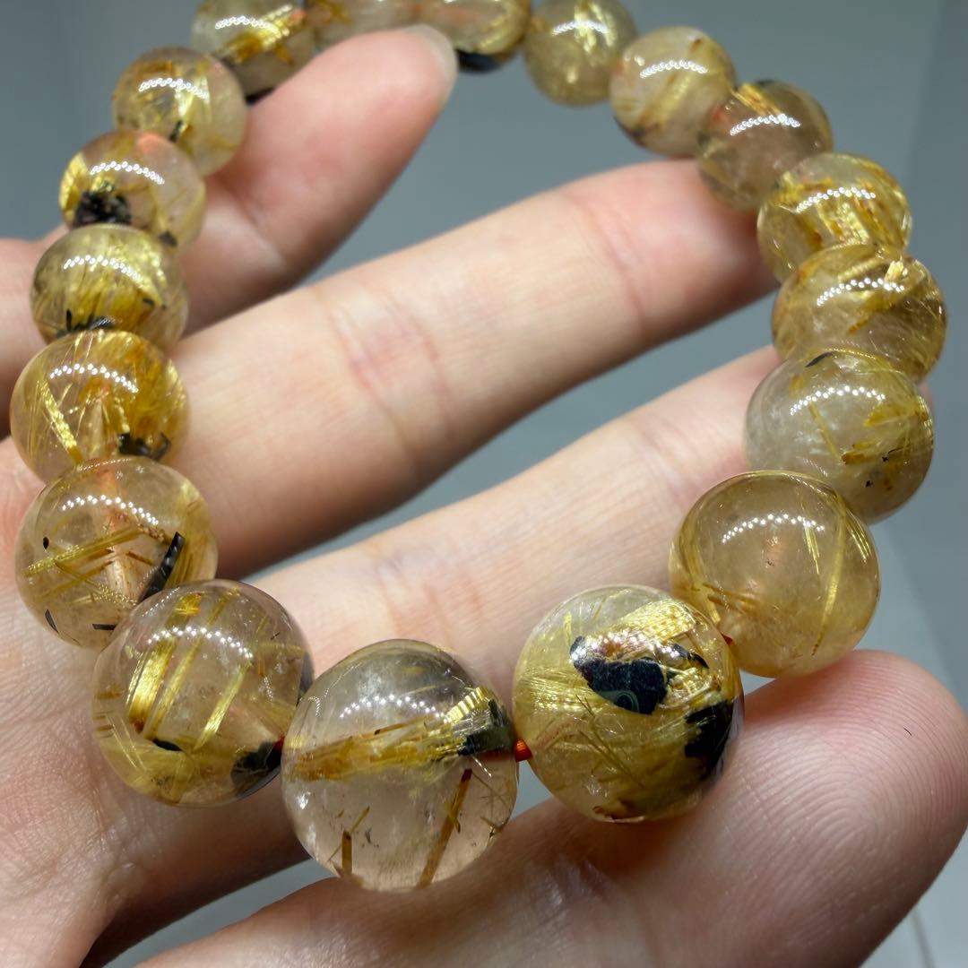 □125ブレスレット太陽放射ゴールドタイチン ルチルクォーツ 金運 z1965□