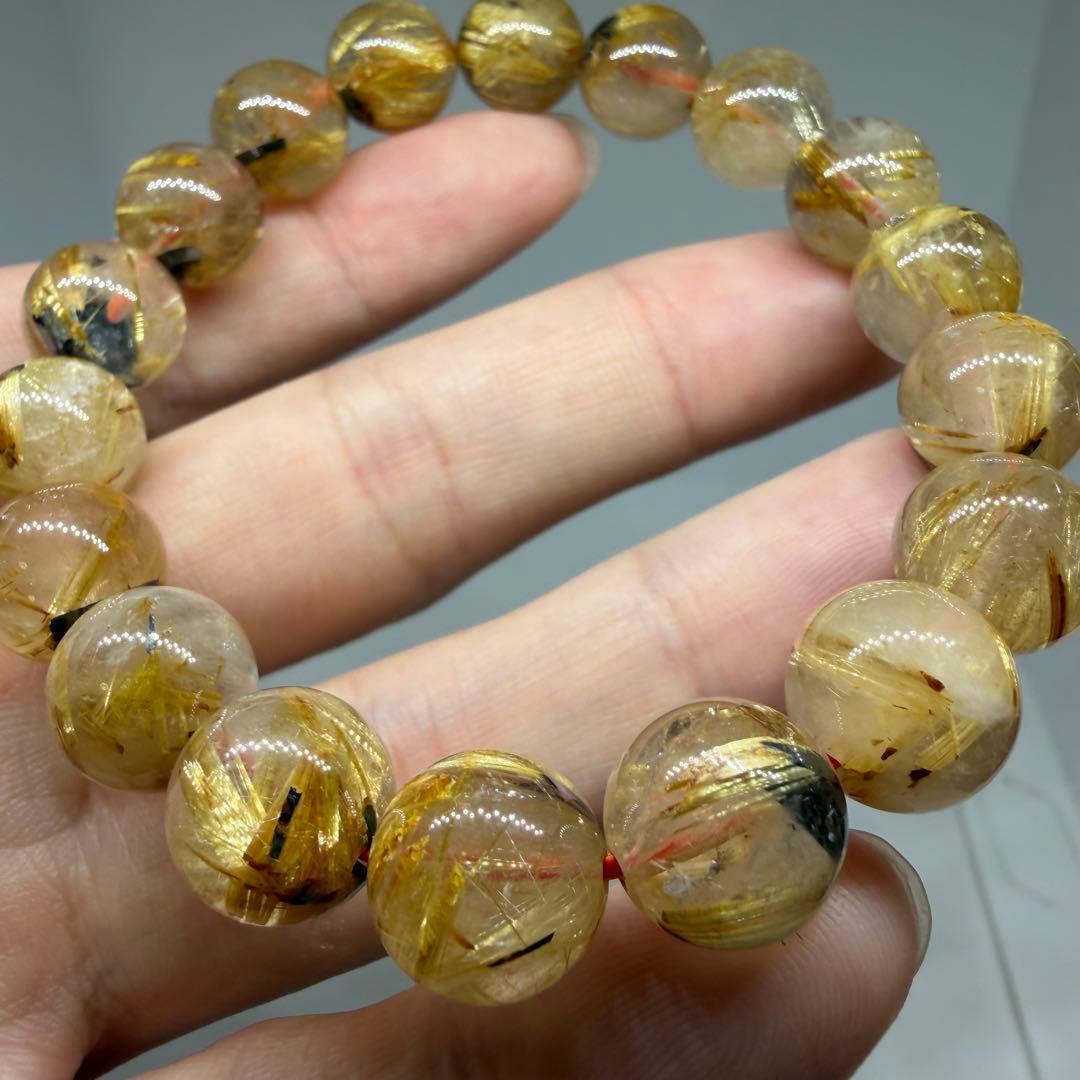 □125ブレスレット太陽放射ゴールドタイチン ルチルクォーツ 金運 z1965□