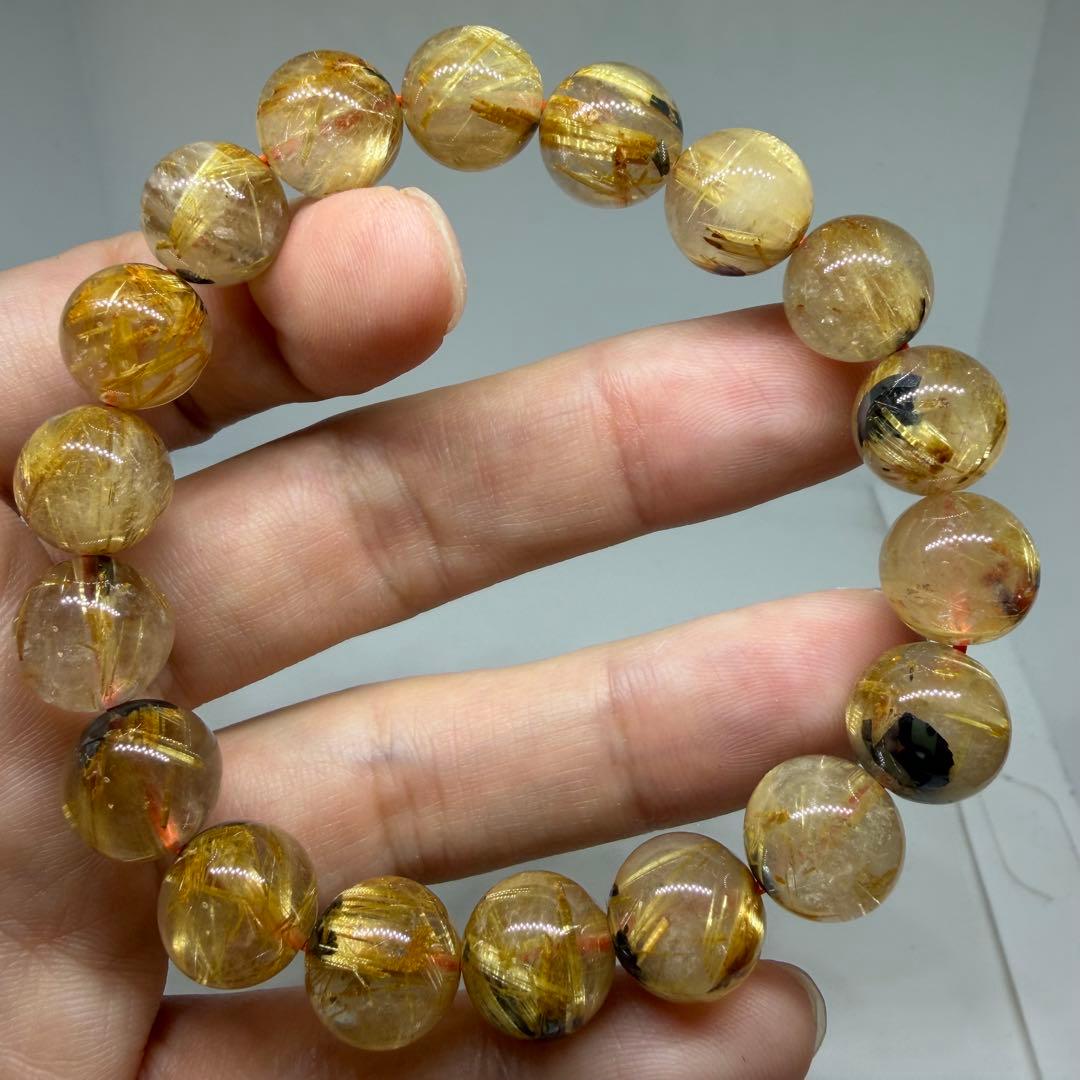 □125ブレスレット太陽放射ゴールドタイチン ルチルクォーツ 金運 z1965□