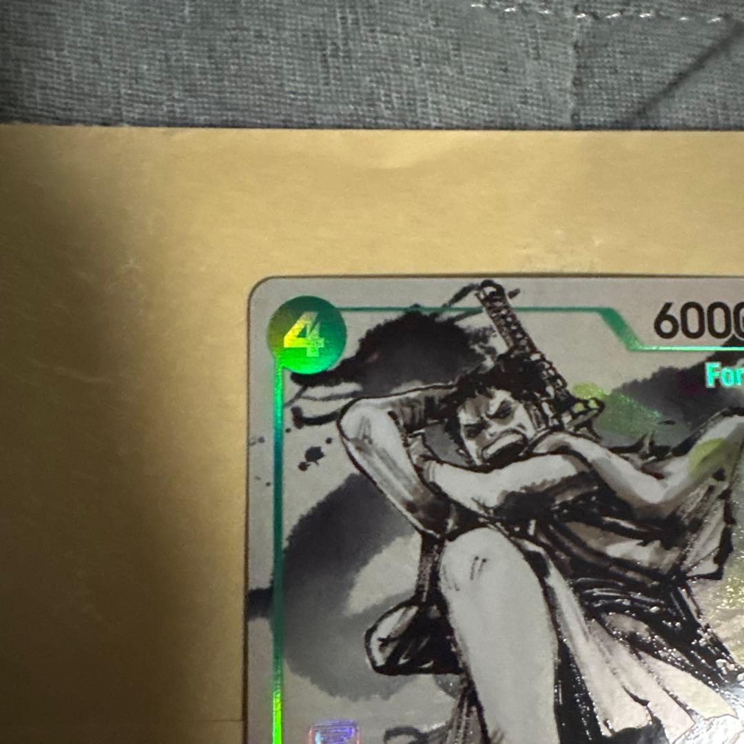 ONE PIECEカード　リューマ　プロモ　MONSTERS 一百三情飛龍侍極