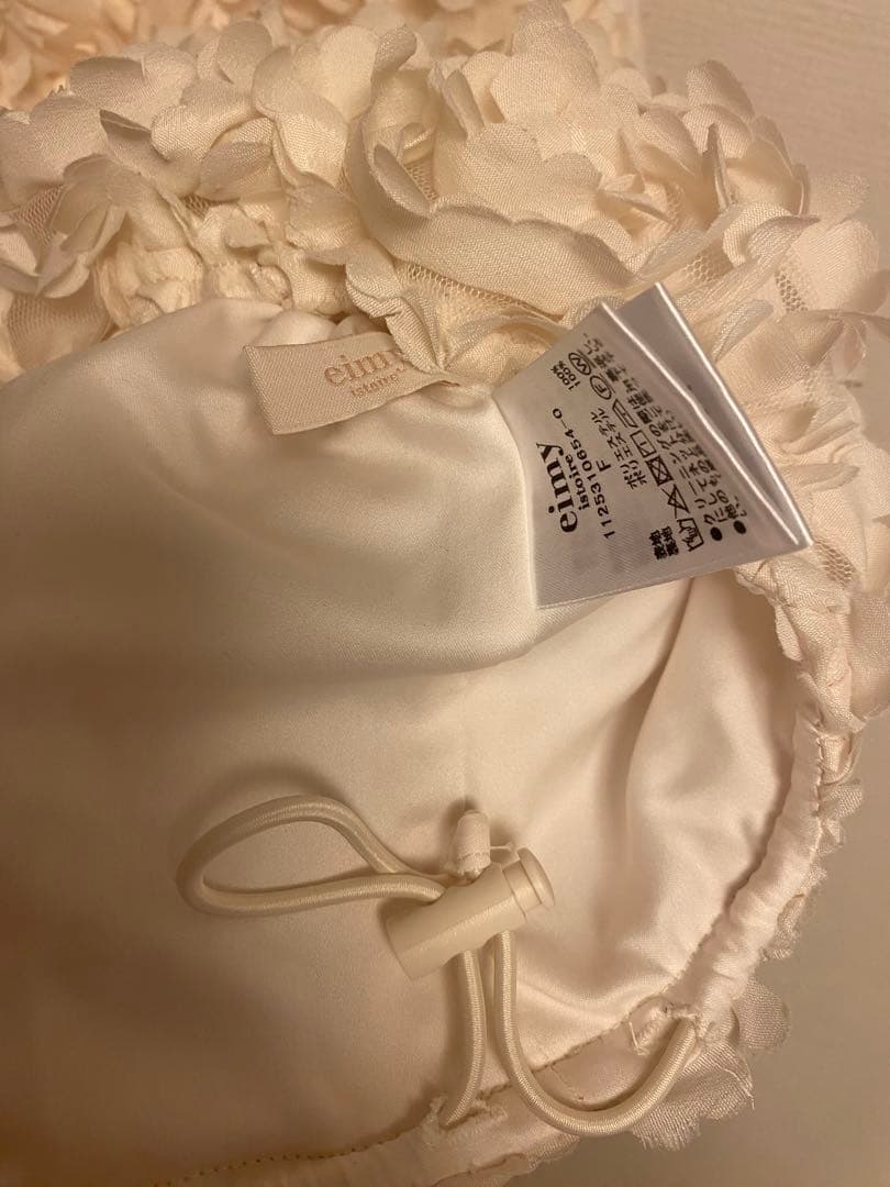 eimy istoire ボリュームフラワーモチーフアメスリトップスアイボリー白