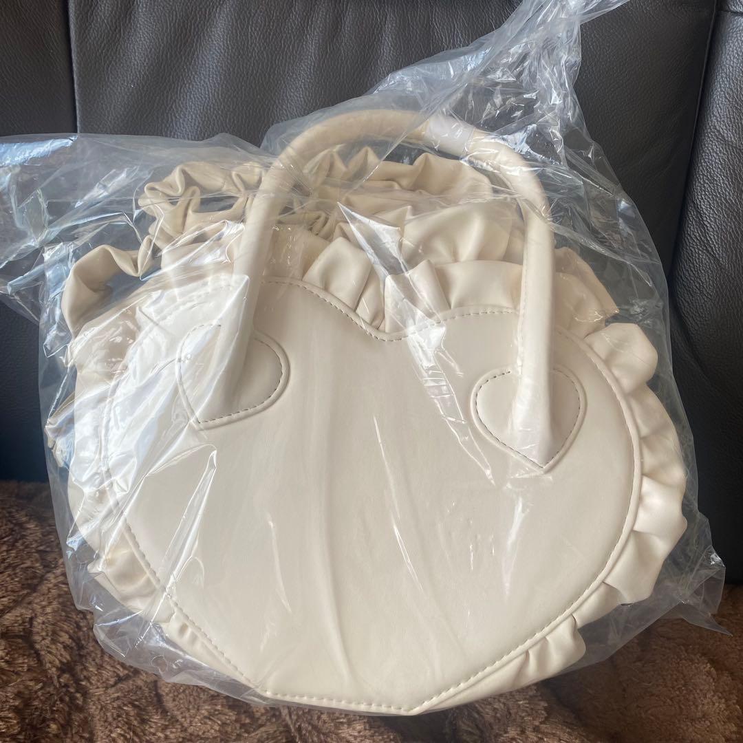 バッグ Treat Urself original leather heart bag.