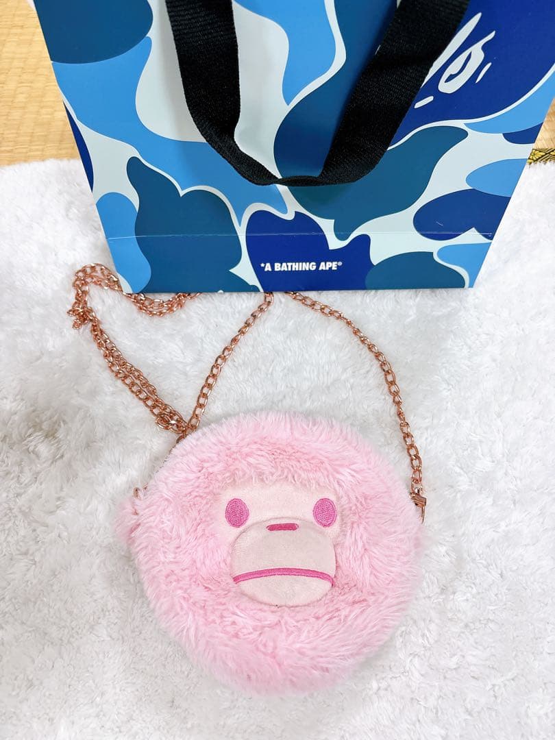ピンクの猿の顔ハンドバッグ