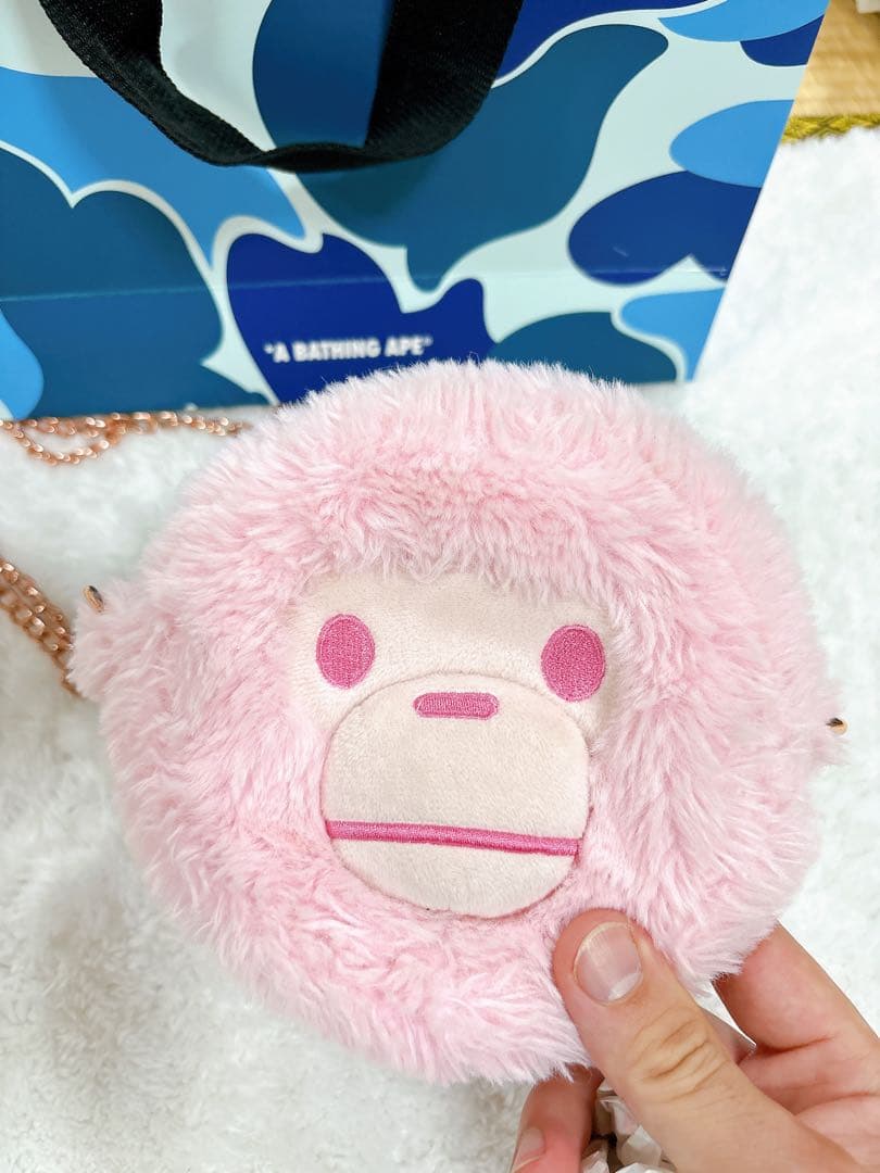 ピンクの猿の顔ハンドバッグ