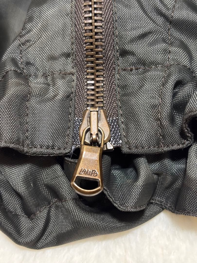 TATRAS（タトラス）のカモフラ柄フード付き中綿ジャケット