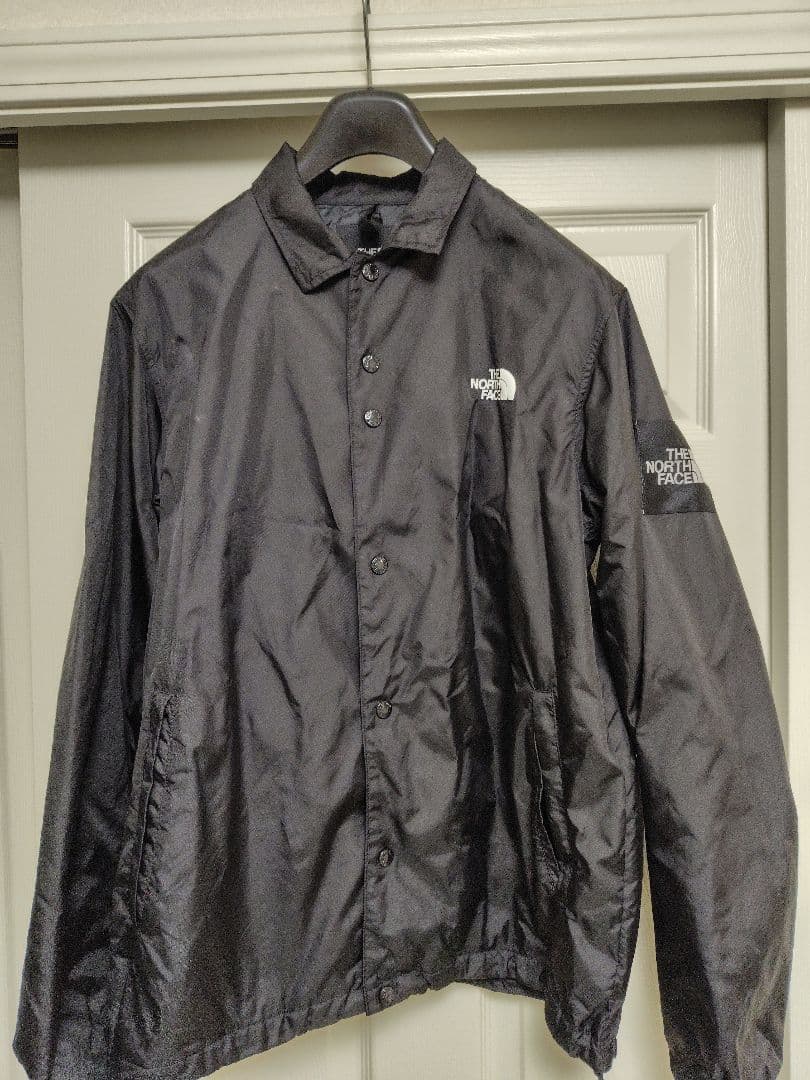 THE NORTH FACE ブラック ナイロンコーチジャケットNP21836