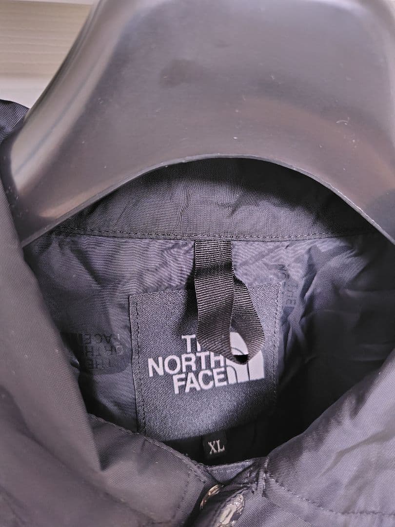 THE NORTH FACE ブラック ナイロンコーチジャケットNP21836