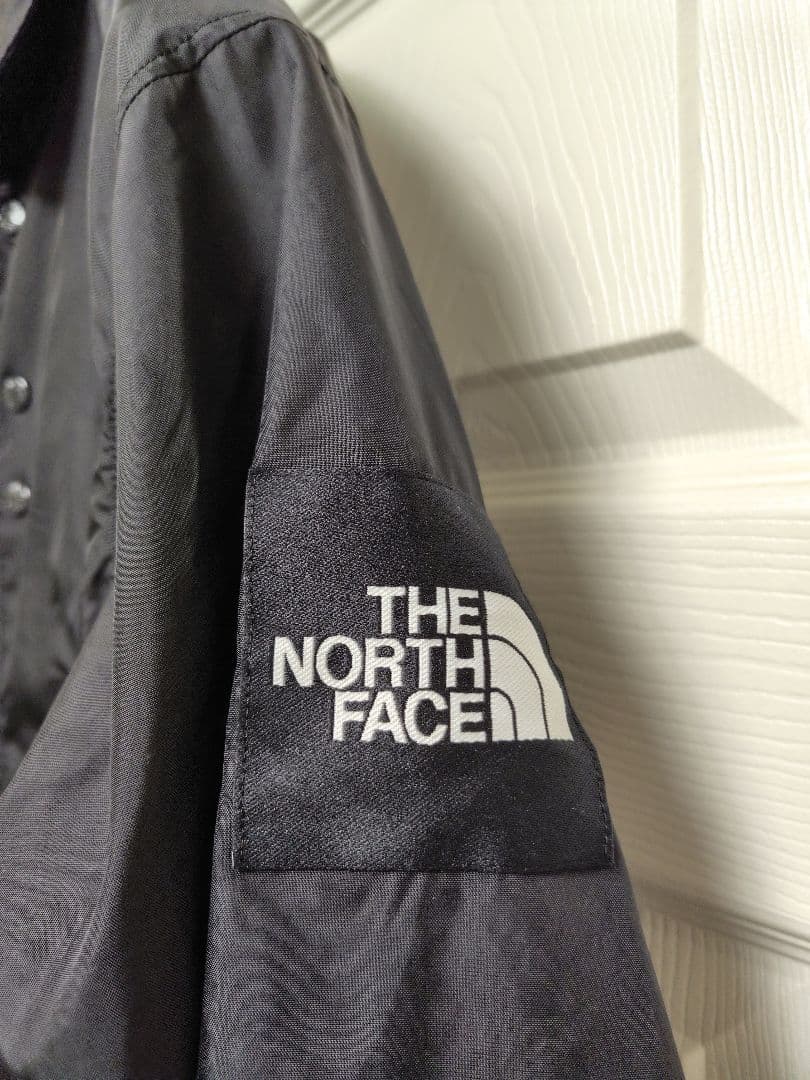 THE NORTH FACE ブラック ナイロンコーチジャケットNP21836