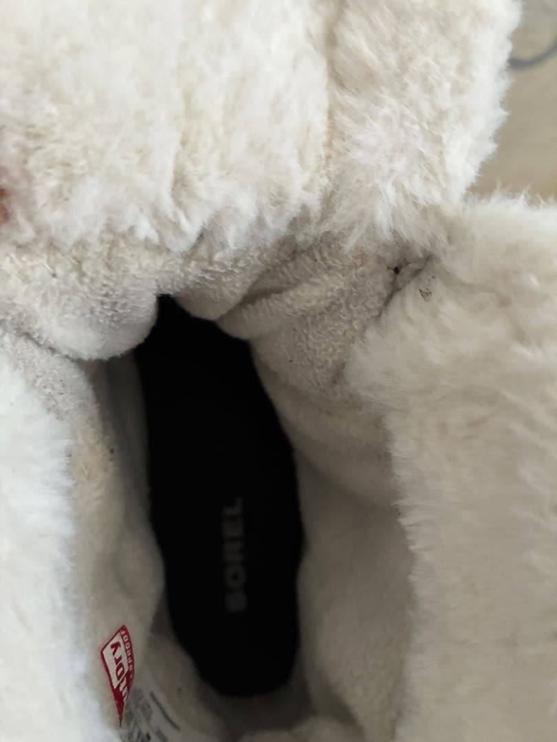 SOREL ファー付きムートンブーツ