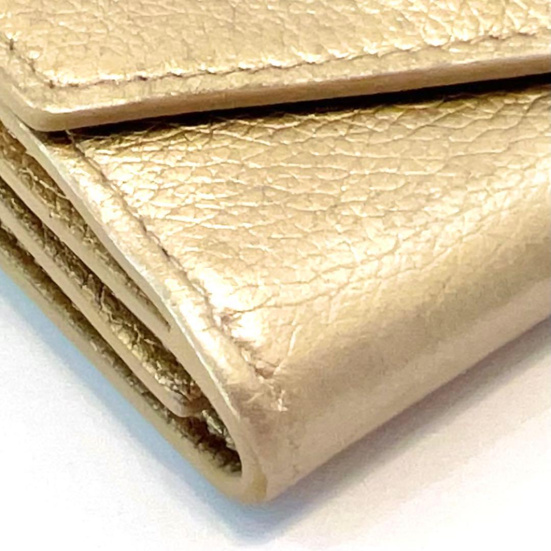 ルイヴィトン ポルトフォイユ ロックミニ 折り財布 ゴールド M69059