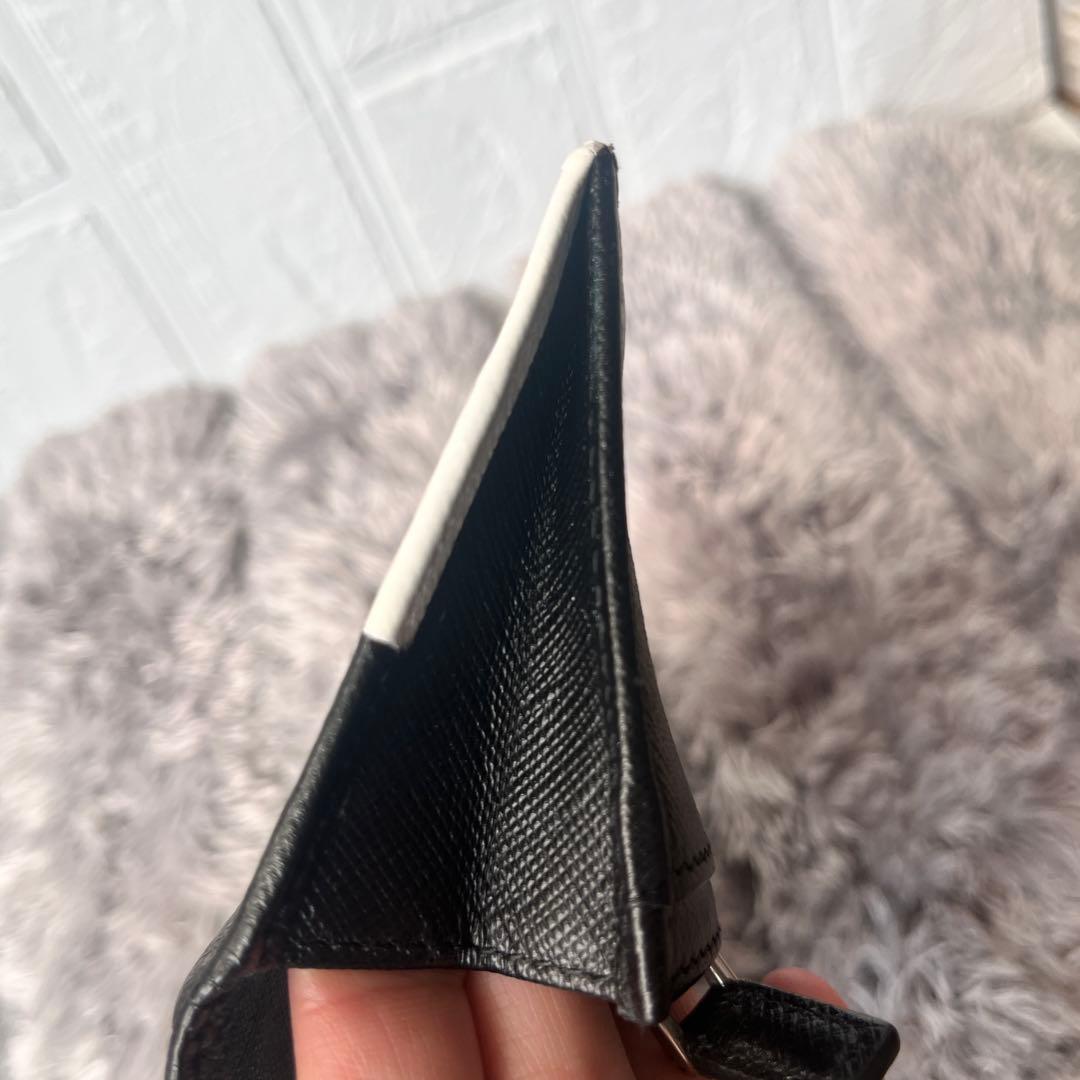 プラダ　メンズ長財布　サフィアーノ　三角ロゴパッチ　バイカラー　ブラック