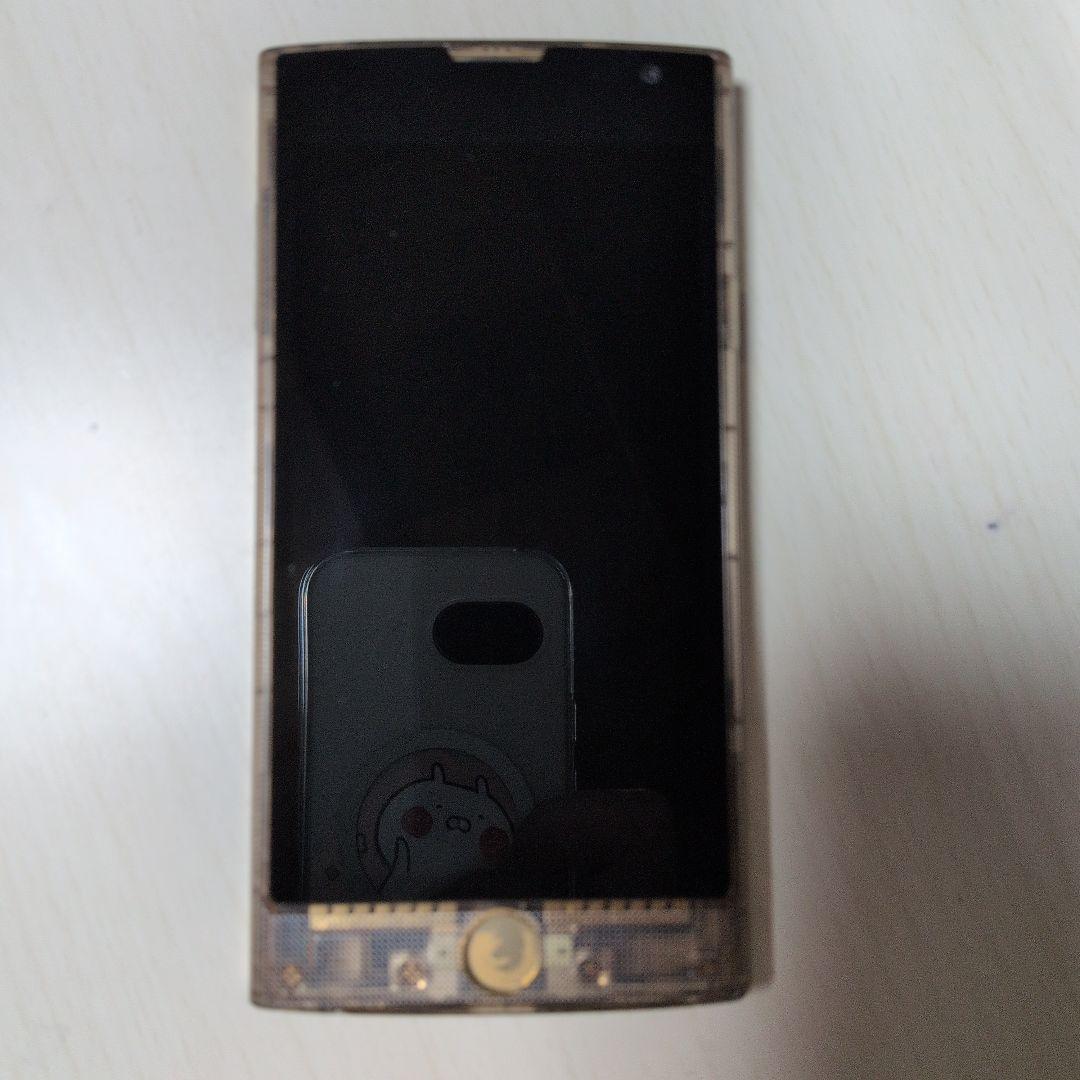 Fx0 スマートフォン 本体 限定背面装着