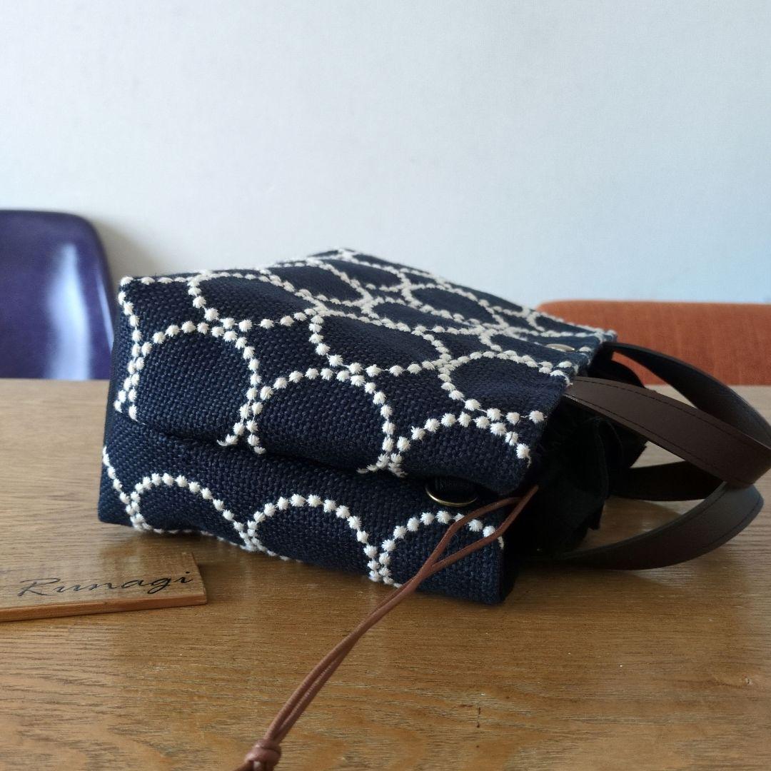 【1549】あおりポケットの巾着バッグ＊ミナペルホネン