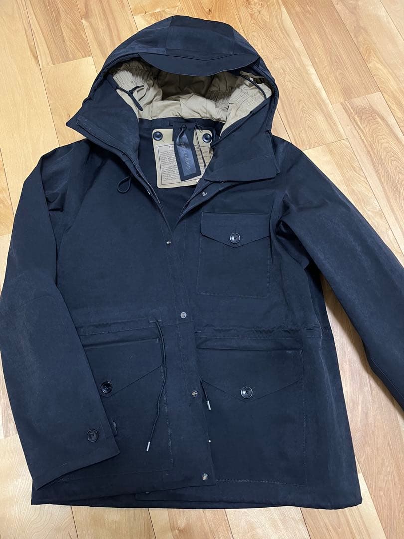 新品未使用187.000円　TenC CARGO PARKA