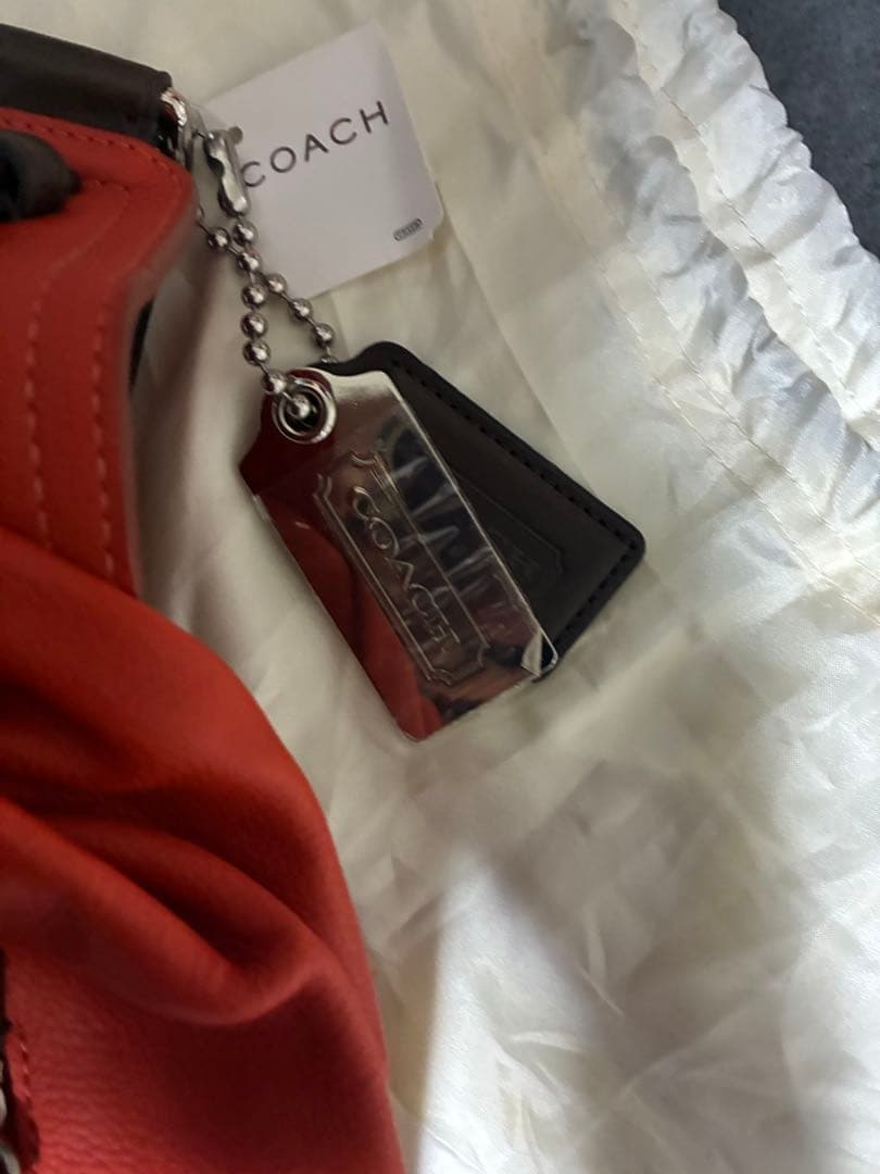 COACH コーチトンプソン ボディバッグ（オレンジ）