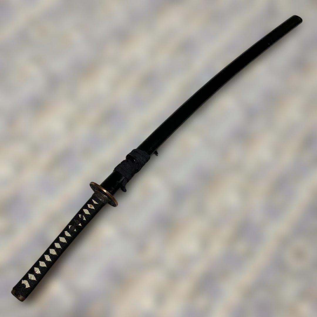 上級模造刀 黒柄 雲龍金縁楕円鍔